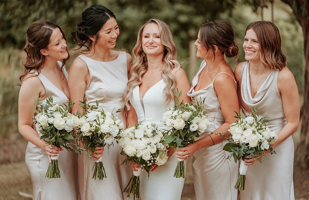 Picture of a bride and 4 brides maids as a parallax background image. Lexi Brownfield - Bridal & Occasion Makeup Artist Benfleet Essex